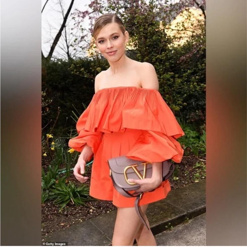 Orange cotton romper with bow